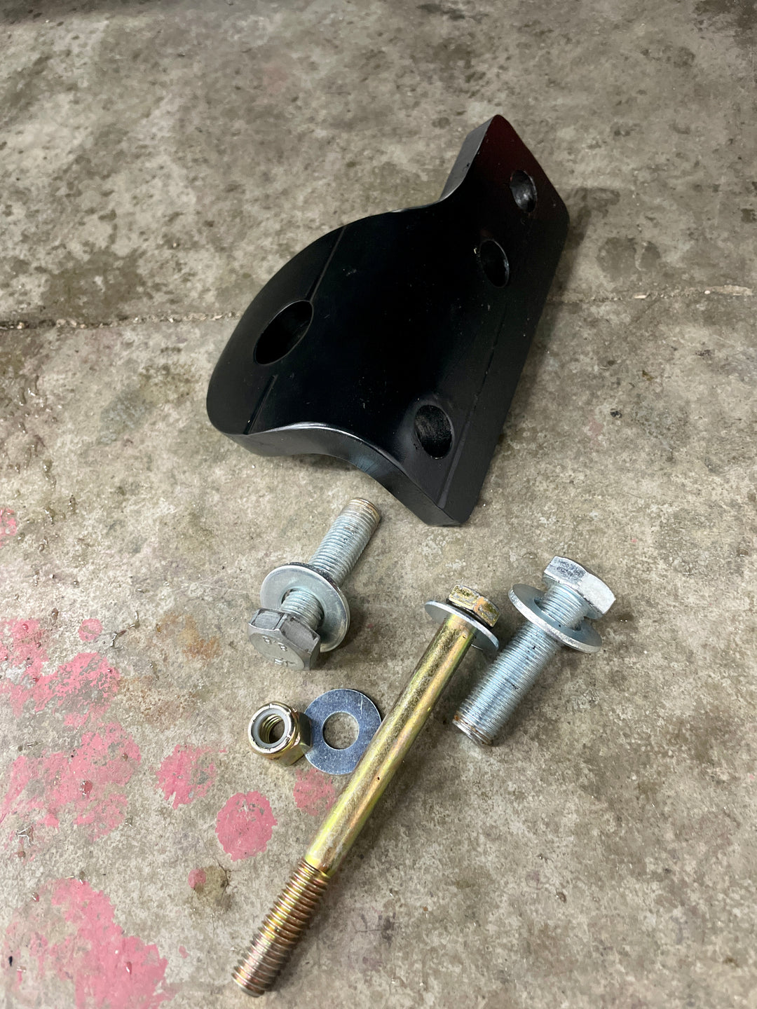 BPF 3rd gen 4Runner Tow Hook Set 1996-2002 featuring a black powder-coated steel mount with accompanying bolts, washers, and nut for secure installation.